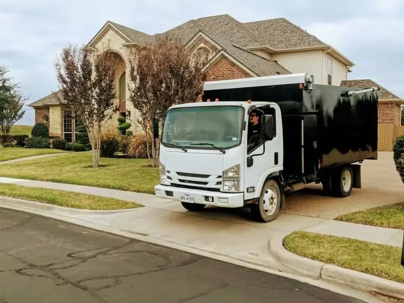 Junk removal truck parked at a home in Homestead, Florida